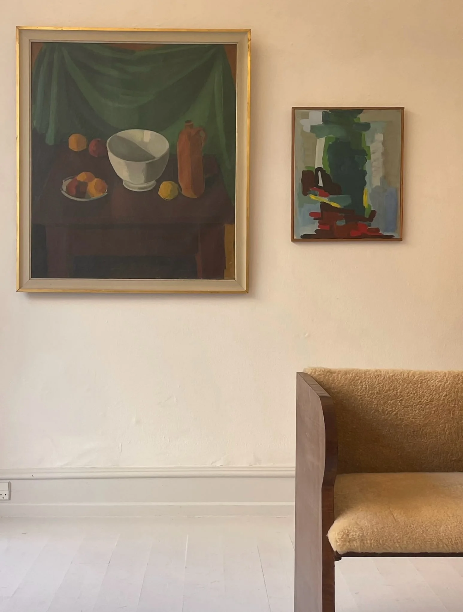 *

A chair, two paintings, a wall.

Very little, really.

But proportion, material and space can be enough to create a room that feels considered.

And then there is the light.

Warm and quiet, it seems to hold everything together.