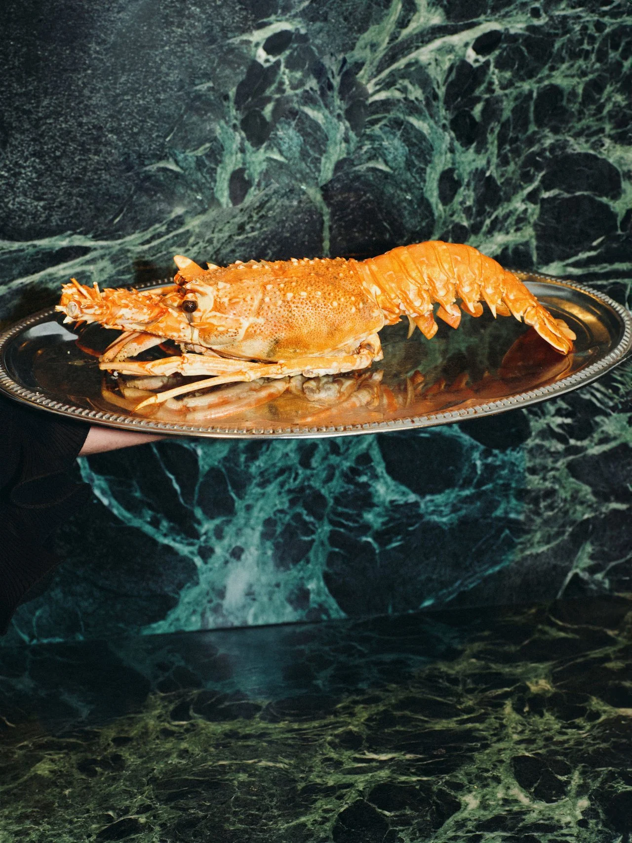 hole lobster served on a silver platter at a Feast with Fiore catered event in Los Angeles.