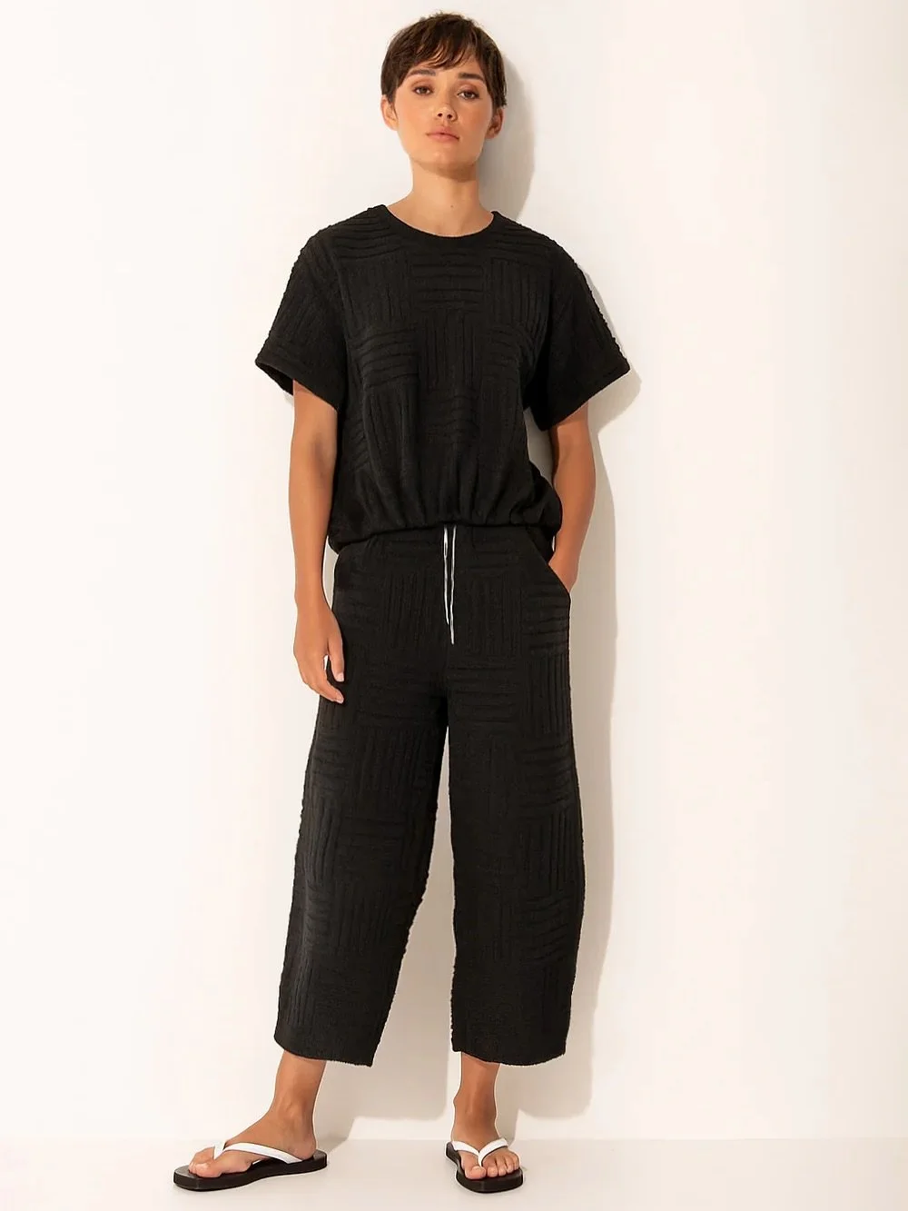 Introducing lounge the label fresh towelling pieces in Ardeche Black.
A cap-sleeve top and a barrel-leg pant designed for comfort, ease and warm-weather style. Perfect for beach days or slow mornings.

In store now at with Emmy Loo, come and style yo
