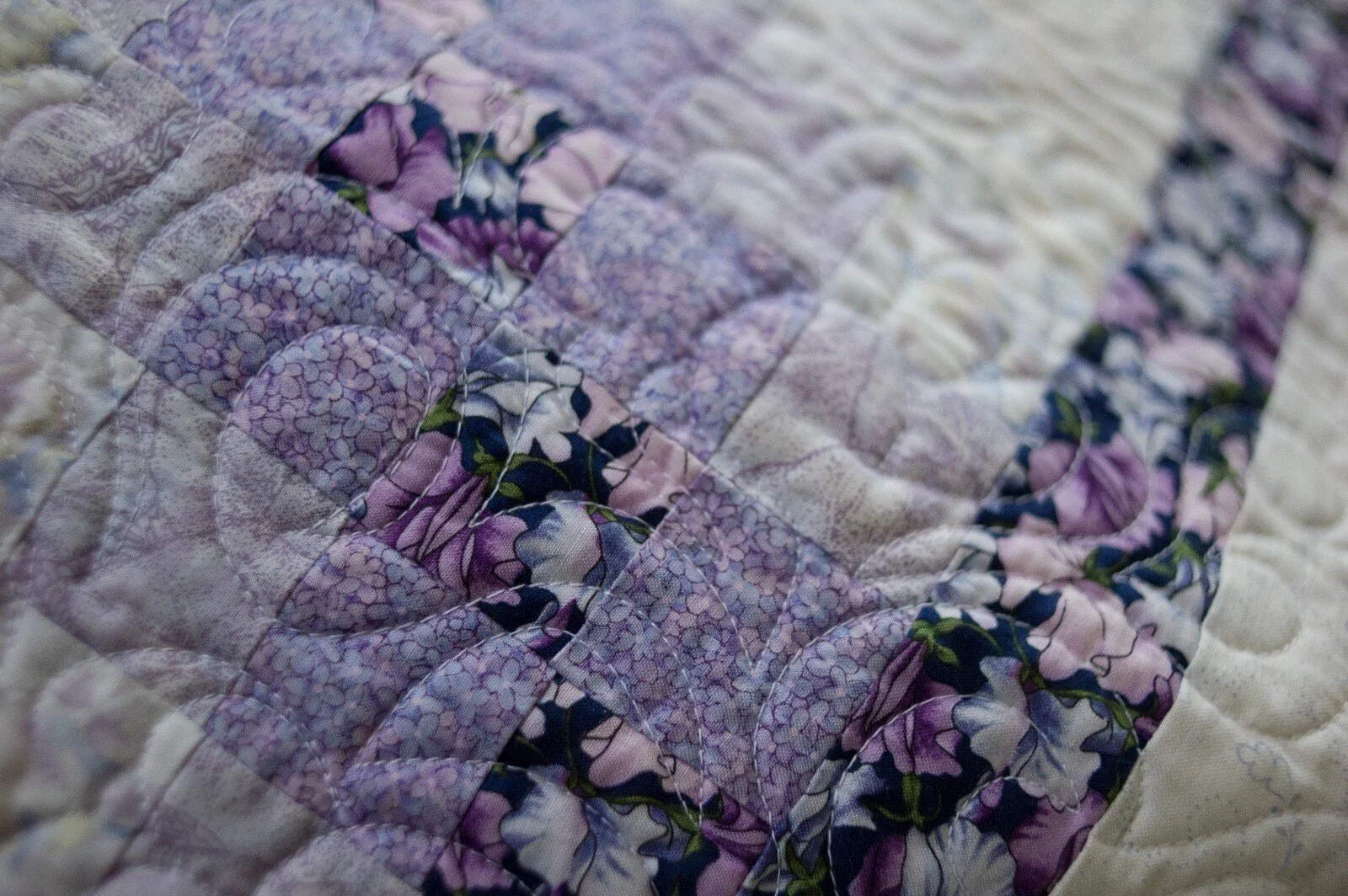 A quilt in Linda’s living room is displayed on a couch on Feb. 6, 2021 in Mount Vernon, Wash. Linda spent about five years away from quilting after her husband passed, but she regained interest in it during the lockdown.