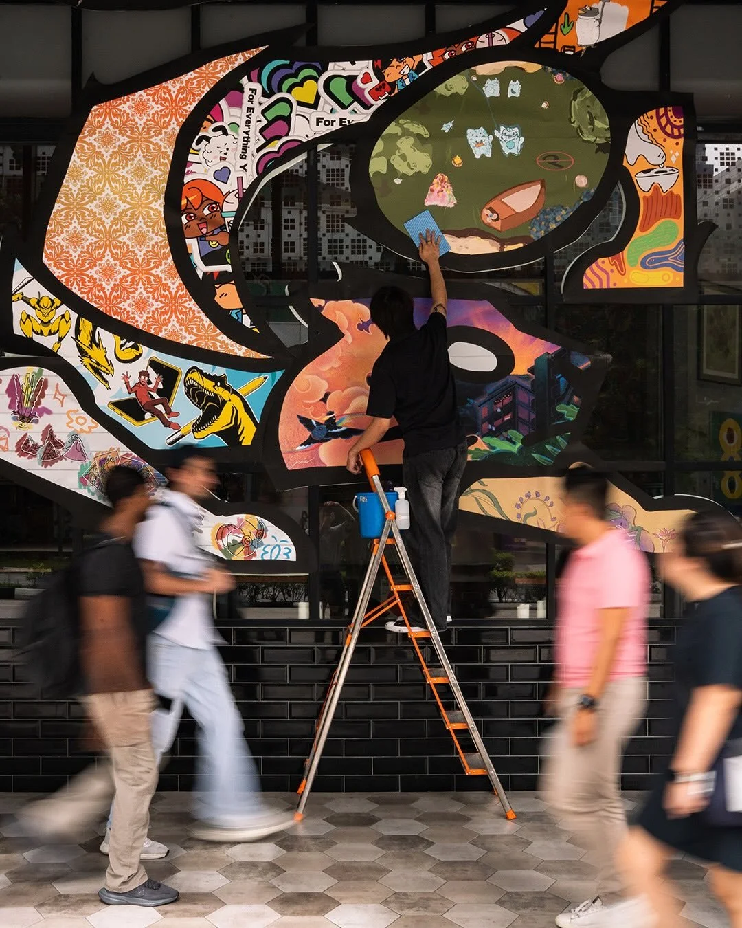 Our new window decal, designed by the one and only @tobyato and nine LASALLE students. 

A cat with nine lives &mdash; one for each student &mdash; all their styles stitched into a single piece. A little reminder that art in this space always comes f