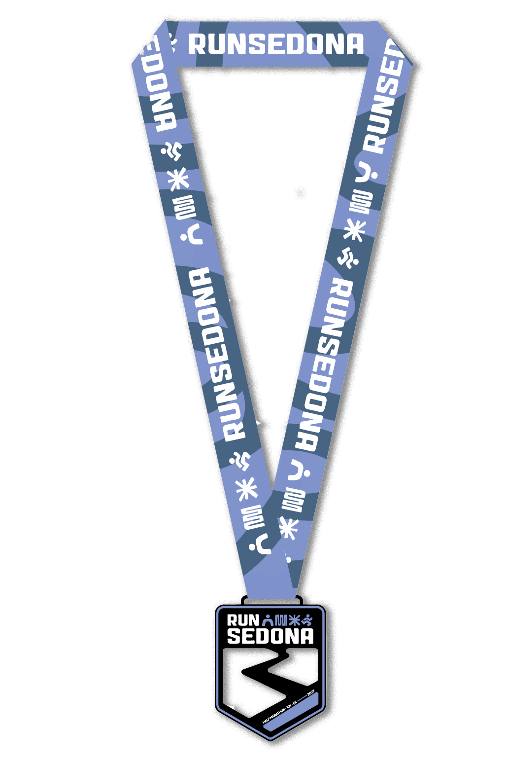 A medal with a blue ribbon displaying the words 'Run Sedona' and various symbols, attached to a black rectangular medal which also has 'Run Sedona' written on it along with a stylized road graphic.