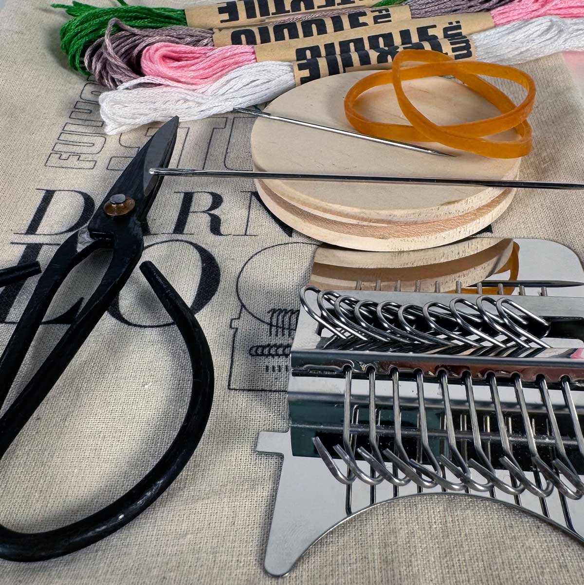 Speedweave Darning Loom Kit with Embroidery threads and Iron Scissors.