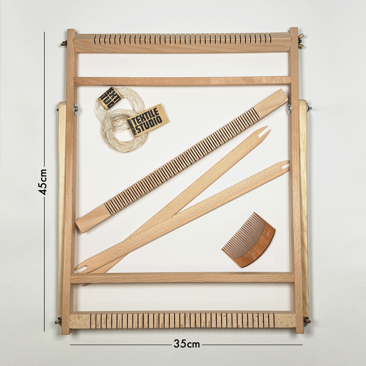 Frame Weaving Loom Kit with heddlebar, shuttlesticks, comb, tapestry needle and warp thread. Fulham, South West London.