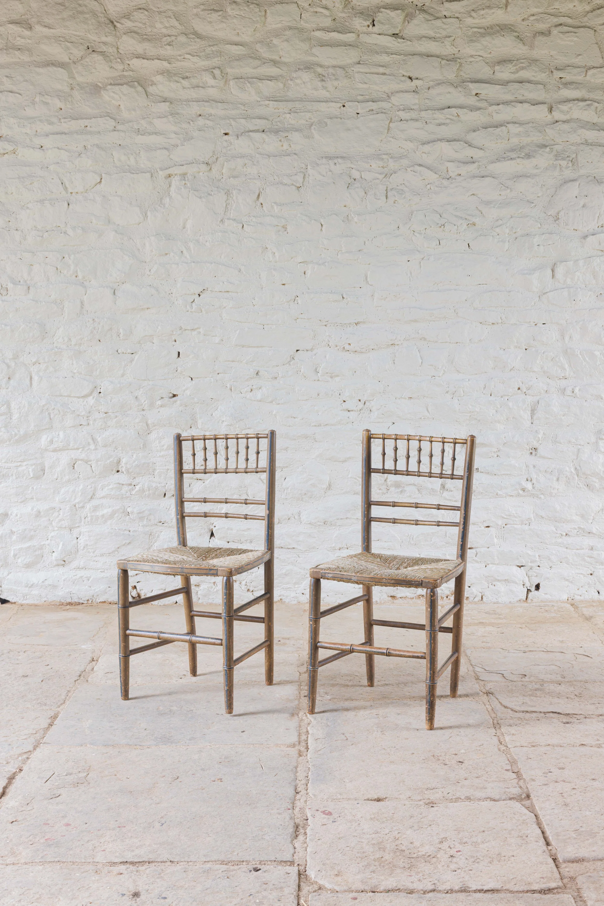 A Pair of Regency painted Chairs