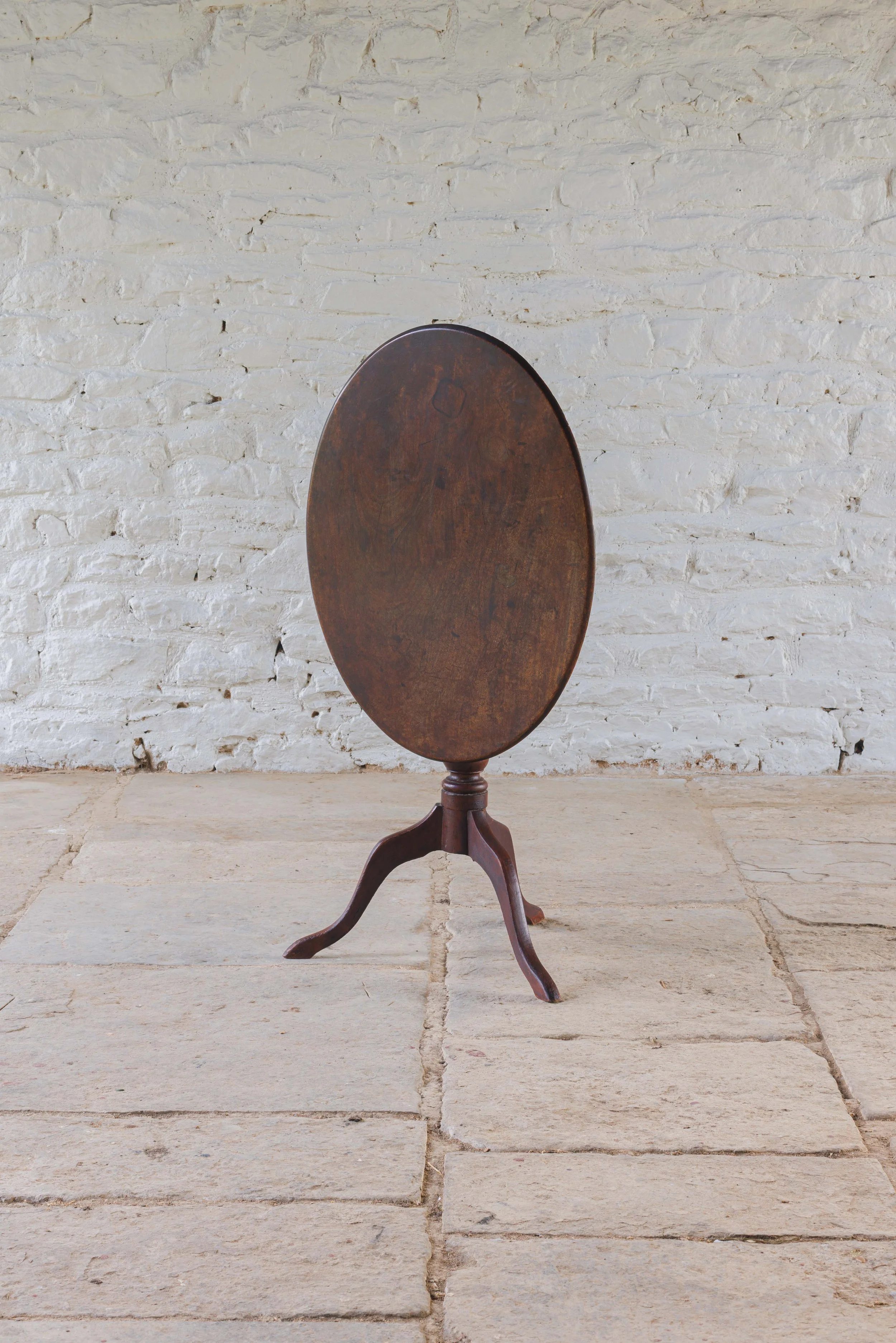 Oval tilt top table