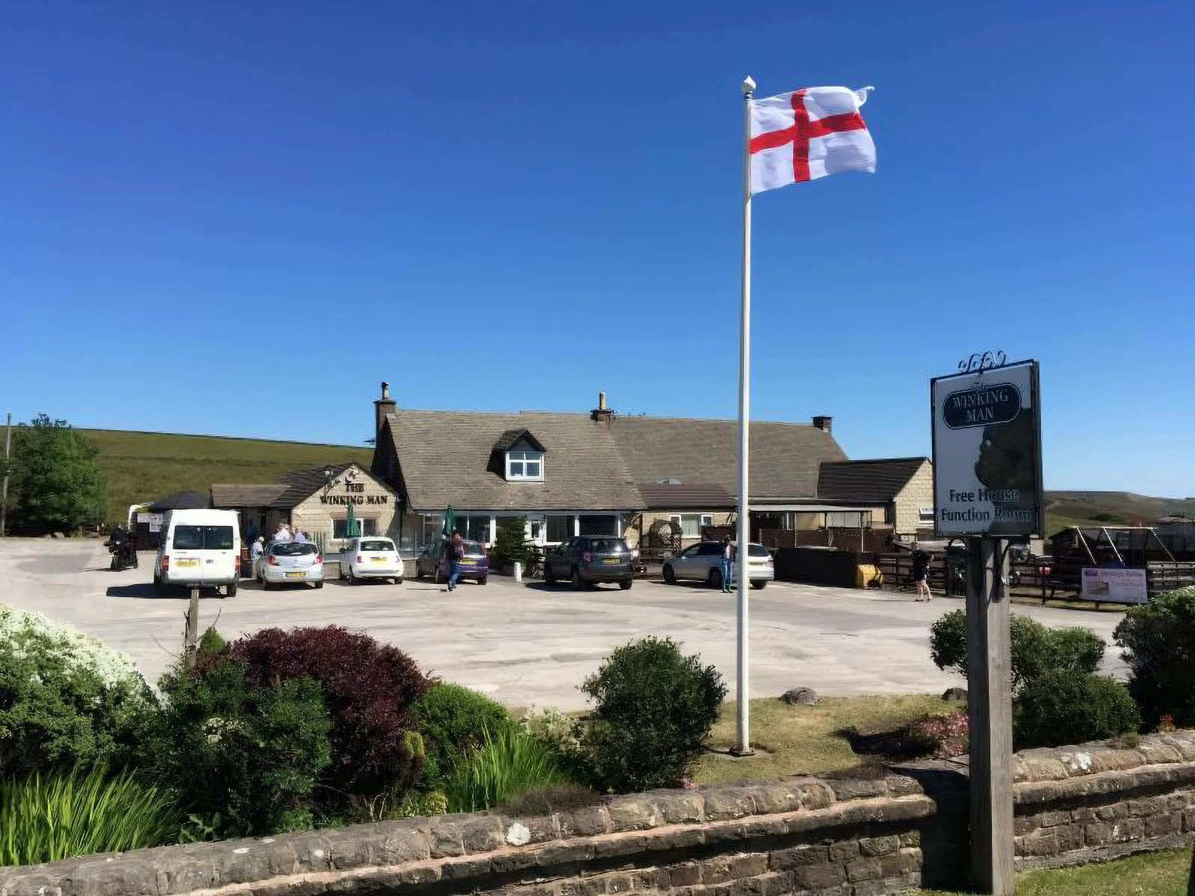 THE VENUE AND WINKING MAN