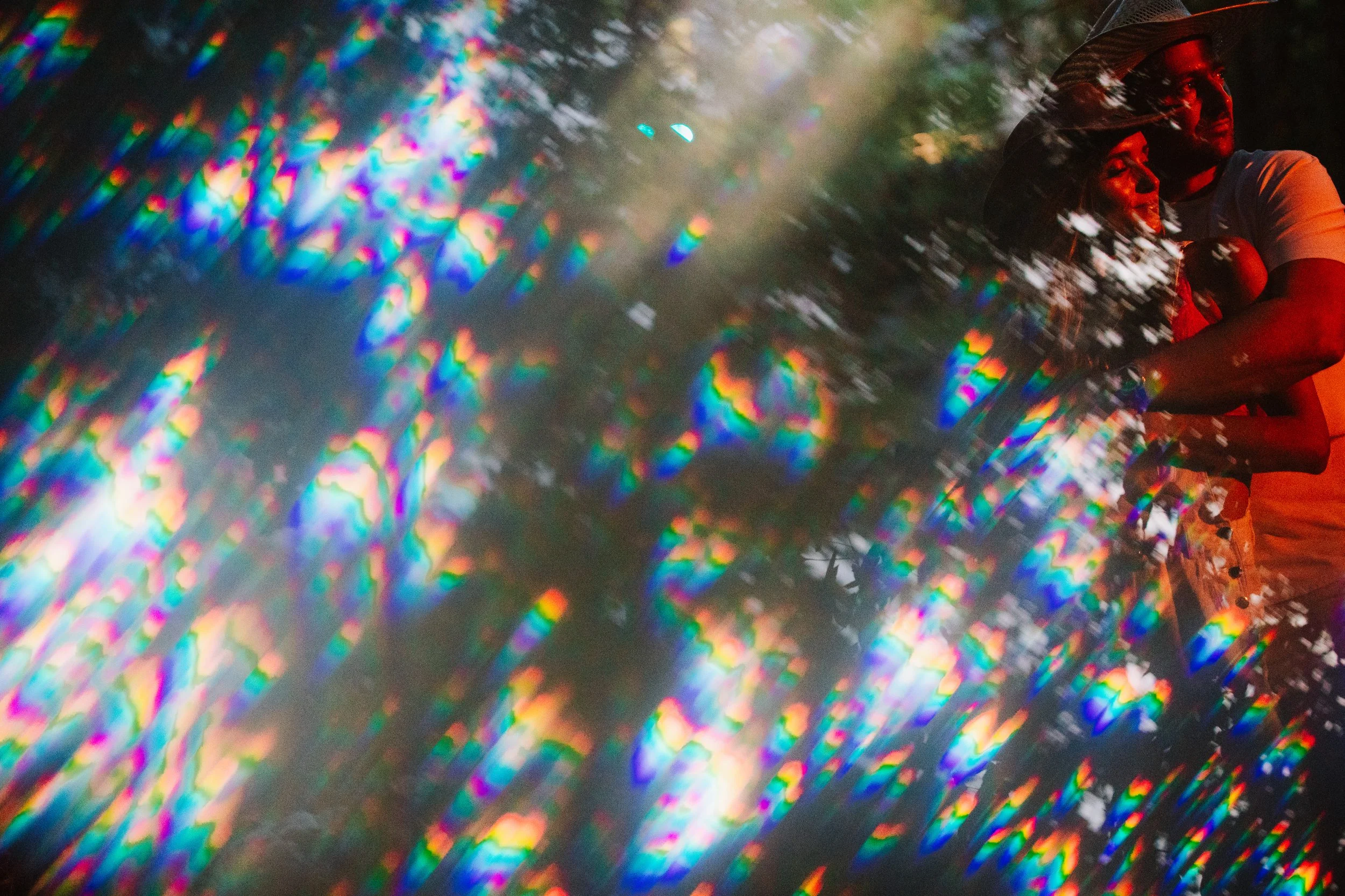 unique use of color and contrast with reflective light and tungsten street lamp