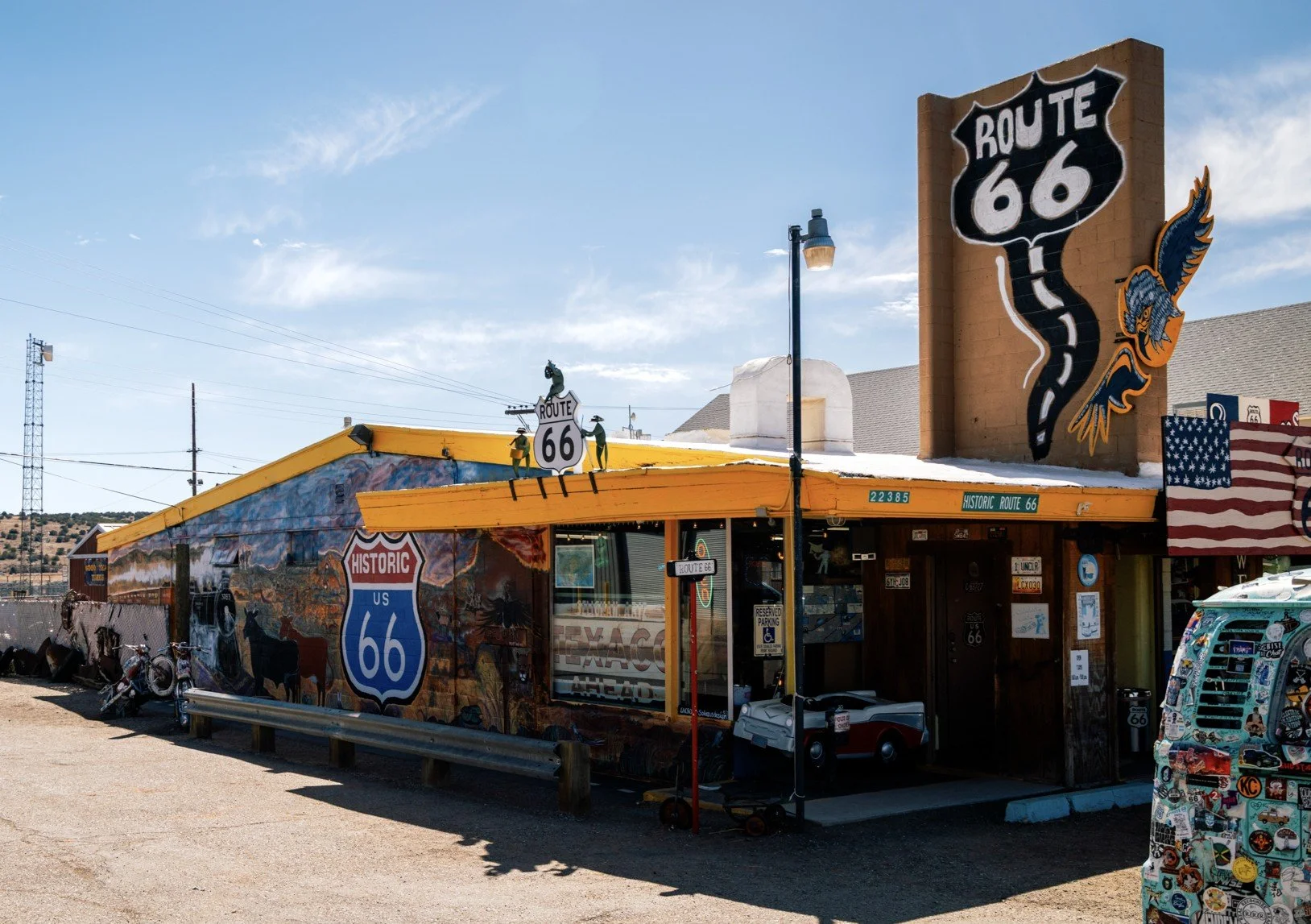 Route 66 Mural Building with Eagle and Vintage Cars