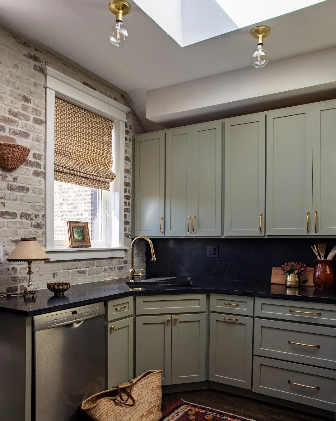 This kitchen had beautiful architecture and great natural light, but the clashing wood tones and seafoam green tile left something to be desired for my client (who has great taste!) 

To give this room the look and feel my client wanted, we painted t