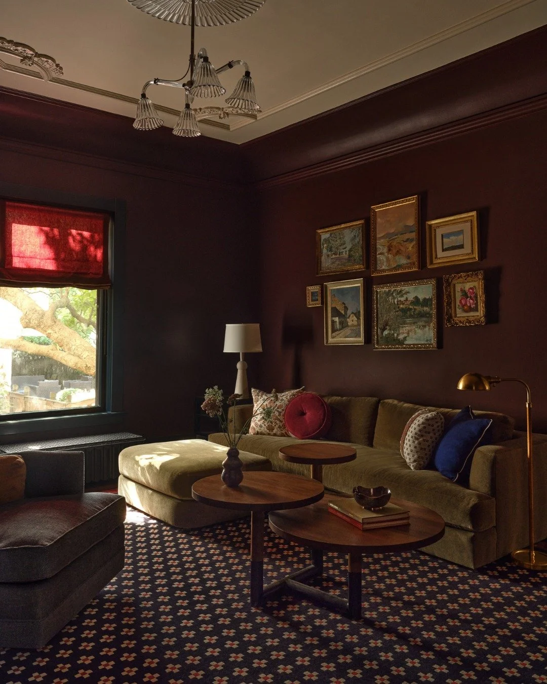 From gray and drab to bold and fab! 🪄

We took this Hinsdale Historic terra cotta remodel project and created a full-on VIBE in this room. The color-drenching walls and custom rug set the tone. 

A vintage gallery wall anchors the space with collect