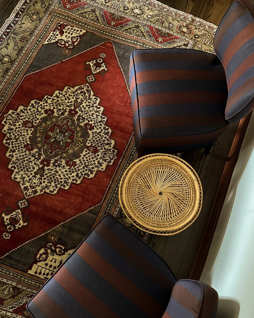 The subtle art of mixing patterns and materials is about trusting your eye (and gut) and being willing to go a little bolder than feels comfortable at first.

In this project, we layered stripe-on-stripe wallpaper in the bedroom, paired vintage pillo