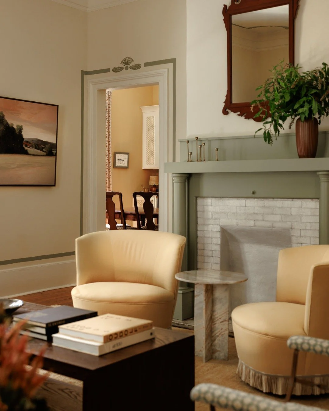 This Oakwood Revival has so many loveable details, one of which is these yellow chairs. 

They started as family passdowns my clients loved, but the dated teal fabric needed an upgrade. Instead of replacing them, we gave them new life: fresh butter-c