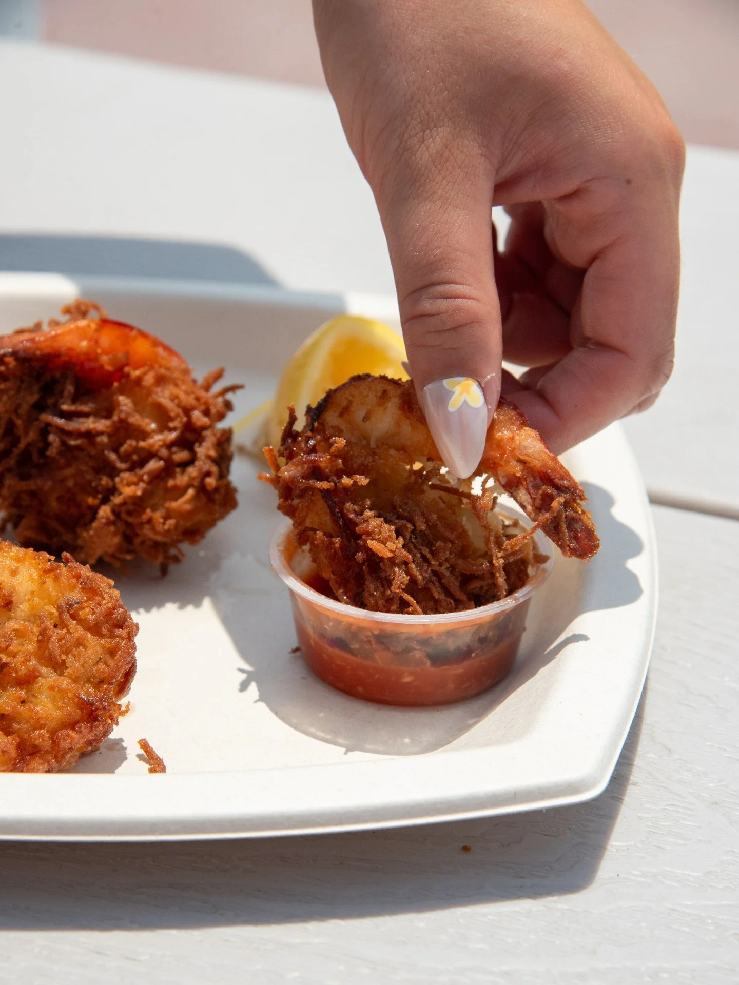 A dip in the ocean, then a dip in the cocktail sauce! 🍤🌊 Relax &amp; enjoy scenic views and delicious eats at Easton's beach Concessions 
.
.
#eastonsbeachconcessions #newportri #rhodeisland