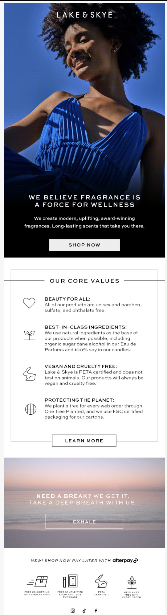 A promotional image of a woman in a blue dress smiling against a blue sky. Text on the image promotes Lake & Skye fragrances and the company’s core values. Includes shopping options.