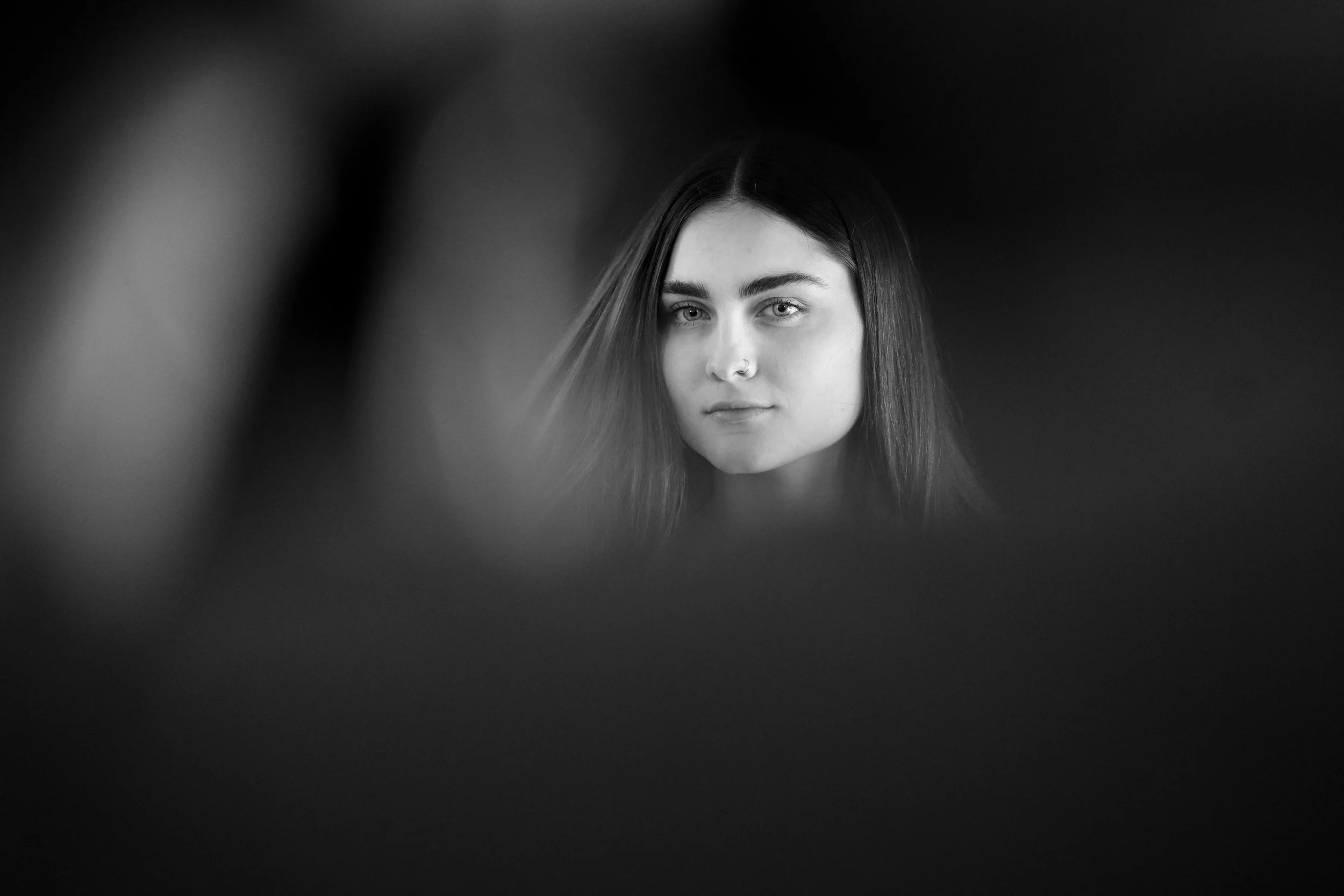 Portrait BNW Young Woman Eye contact
