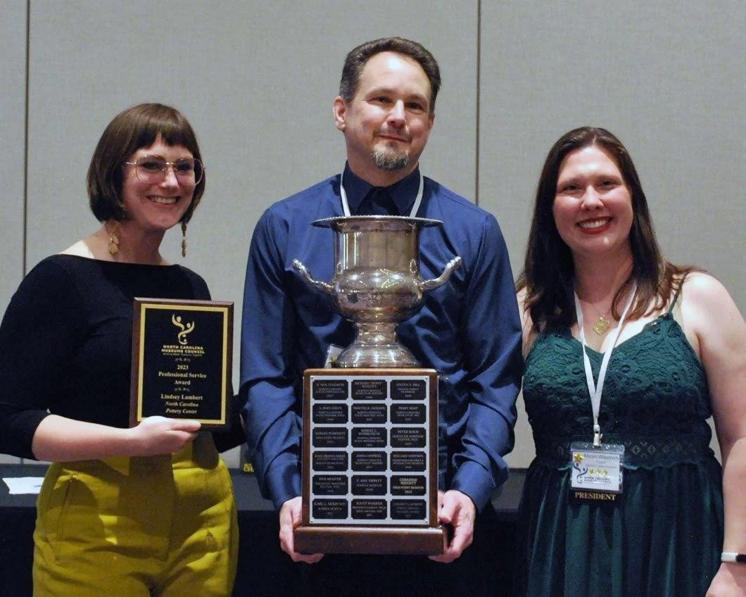 Executive Director Lindsey Lambert receives professional service award from NC Museums Council.