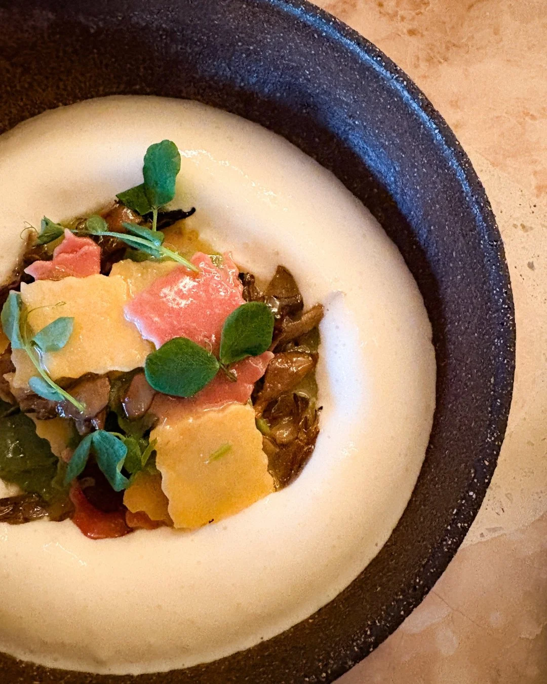 Tangle /ˈtaŋ-gəl/ (n.)
A silken swirl of flavor and flora.

In Greece, hilopites are a humble egg noodle &mdash; here, they&rsquo;re reimagined in three hues of beet, lemon, and lovage, each carrying a note of the land. The beet grounds, the lemon br