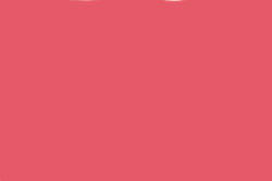 Solid pink background with no objects or details.