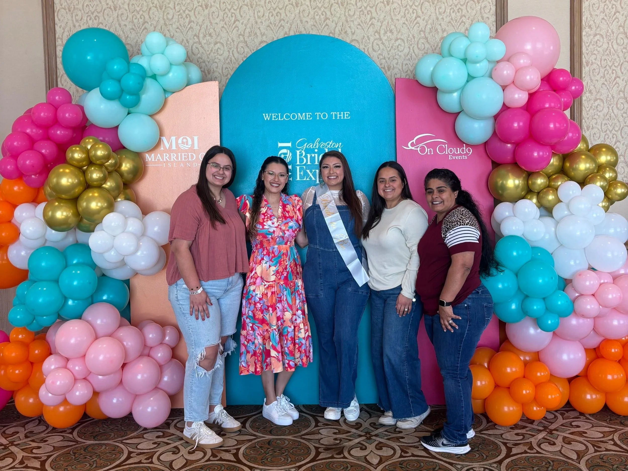 Married On Island Bridal Expo Attendees posing at the Galveston Island Convention Center