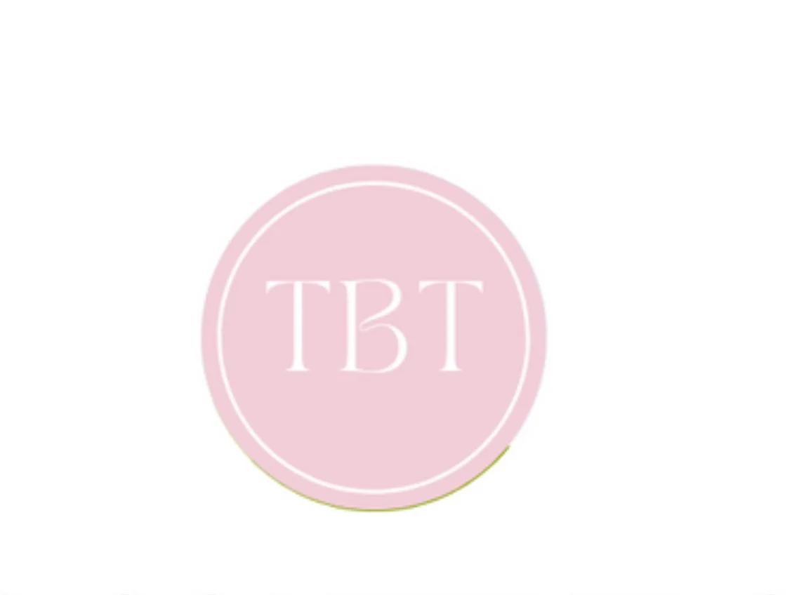 Pink circular logo with white initials 'TBT' inside, on a white background.