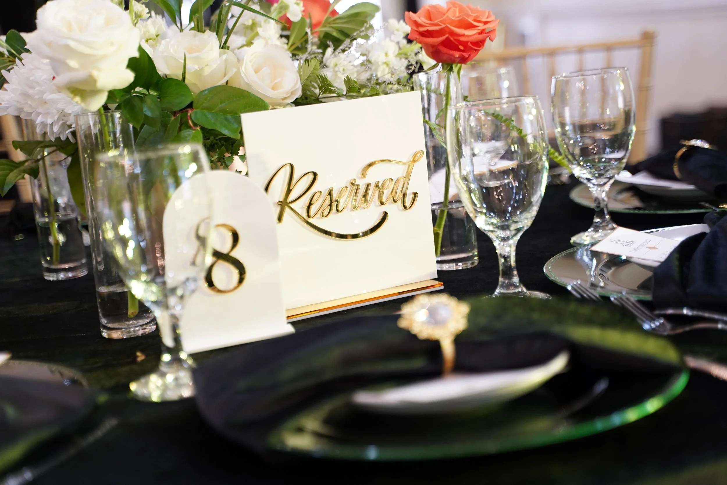 Green and Orange Design with Reserved Table for Corporate Event's Banquet | Gala designed by a Michigan Corporate Event Planner