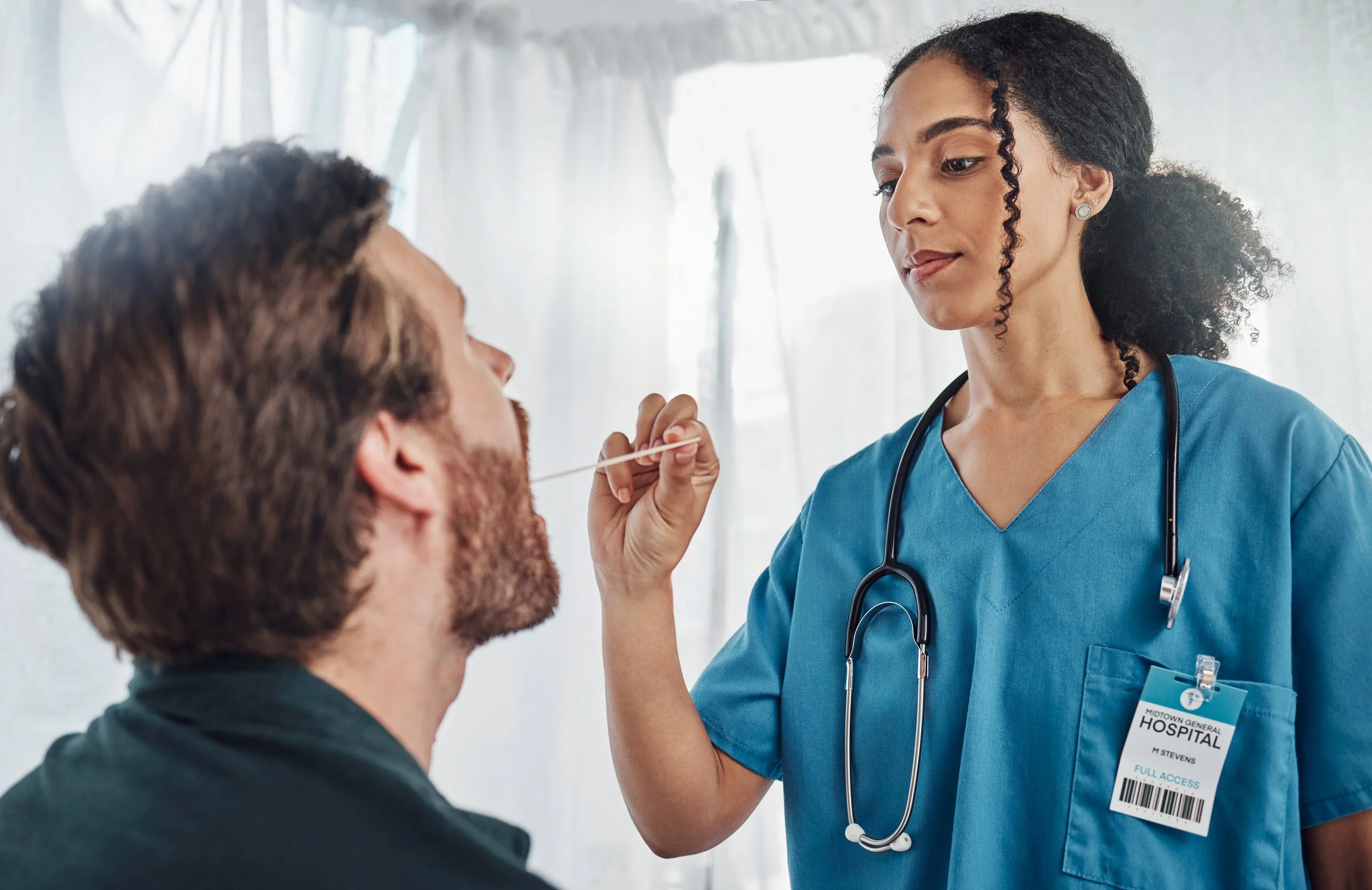 healthcare-doctor-check-patient-throat-and-medica-2023-11-27-05-30-50-utc.jpg