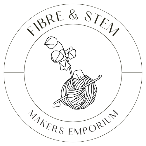 Logo with a ball of yarn, knitting needle, and a small plant, with the text 'Fibre & STEM Makers Emporium' surrounding the image.