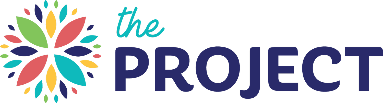 Colorful logo of 'The Project' featuring a multicolored floral design on the left and stylized text in different fonts and colors.