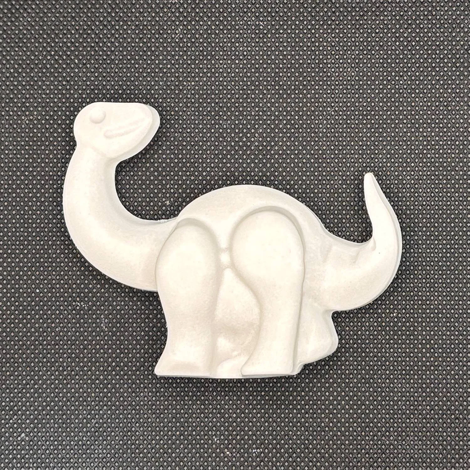 Figura de yeso de dinosaurio para pintar, estilo 3. Medidas: 6,5 × 7,5 cm.