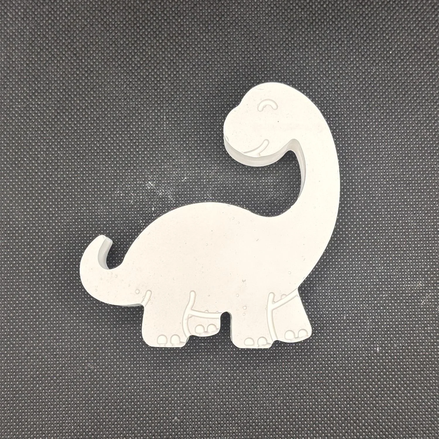 Figura de yeso de dinosaurio para pintar, estilo 8. Medidas: 8,5 × 8 cm.