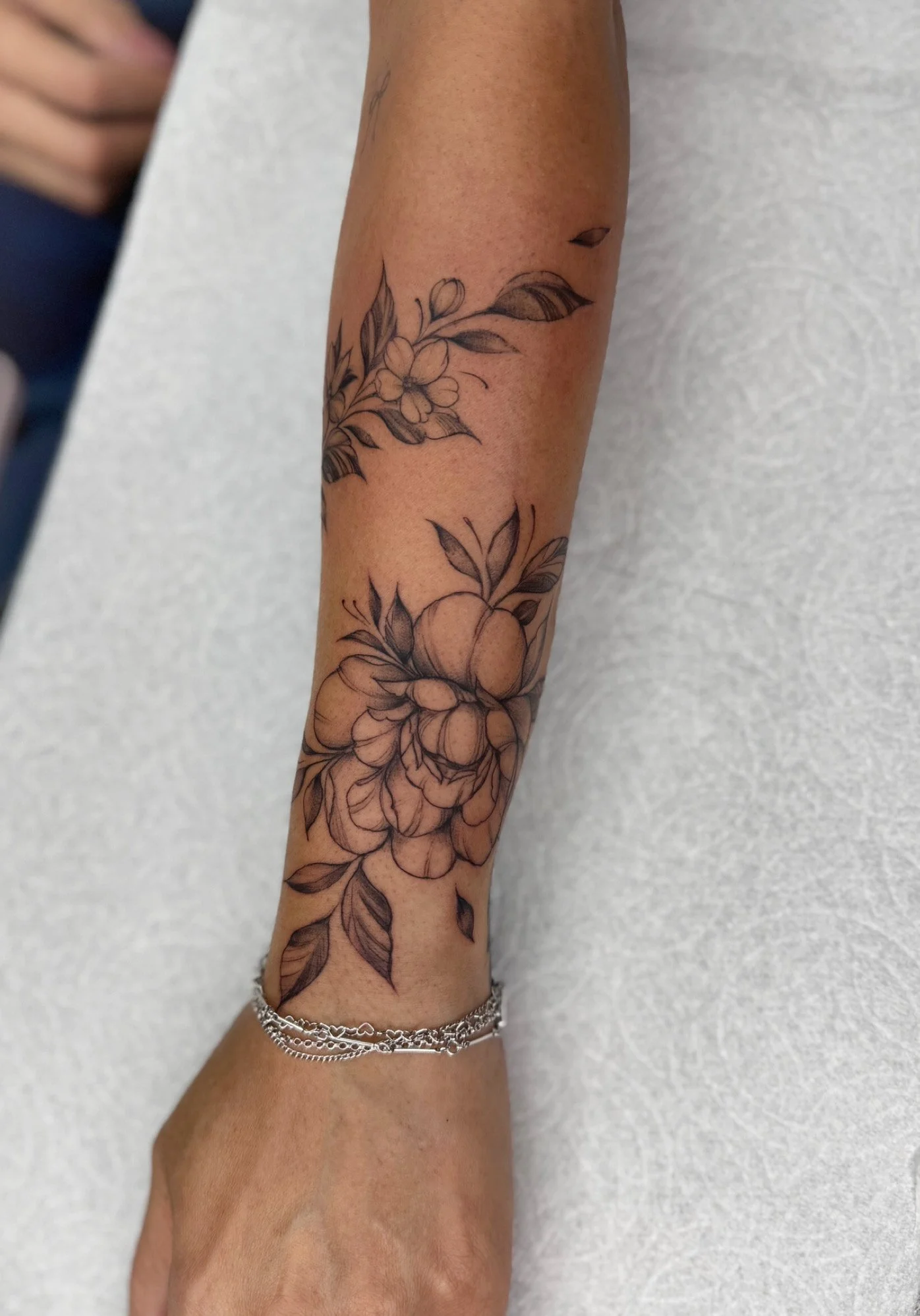 Peony wrap tattoo
