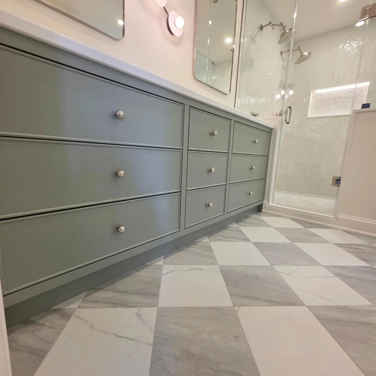 This custom vanity we built and installed @golden.ridge.homes features beaded slim shaker doors, perfectly aligned reveals, and a timeless painted finish that elevates the entire space in this ensuite renovation.

It's the small details that separate