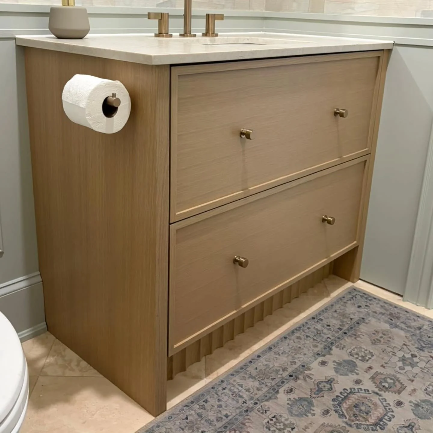✨ Small space, big impact. ✨

Custom rift white oak vanity with clean slim shaker drawer fronts - it brings warmth and timeless design to the space while maximizing every inch of functionality.

The deep drawers keep everyday essentials organized, wh