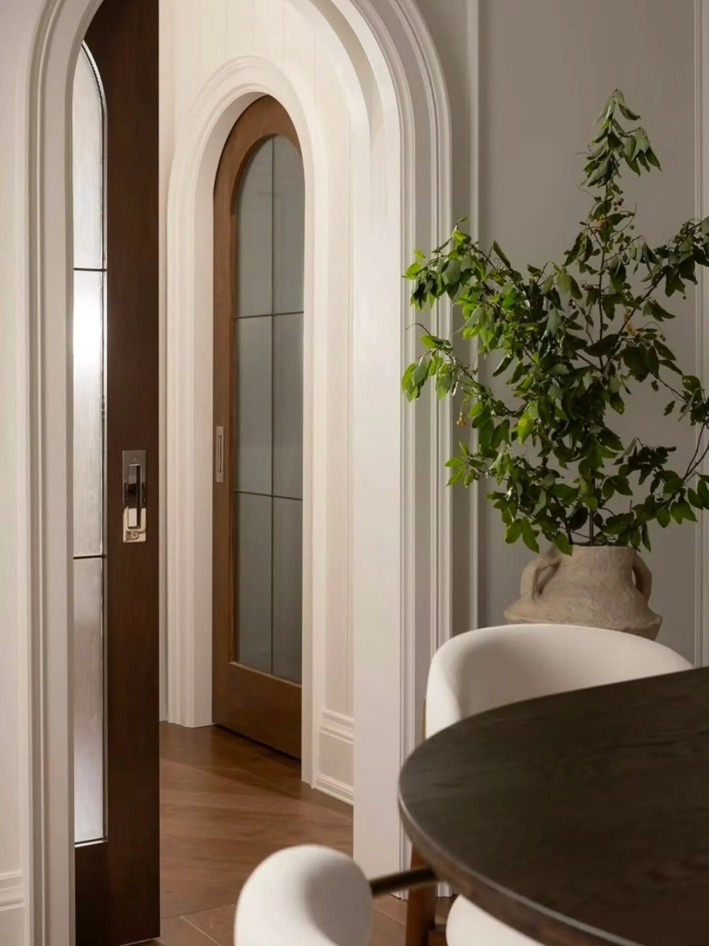 I cant say this enough...Details Matter!!

From the curved openings and layered mouldings to the custom arched white oak pocket doors with reeded glass. 
Every element was designed to flow seamlessly throughout this home.

The warm wood tones add con