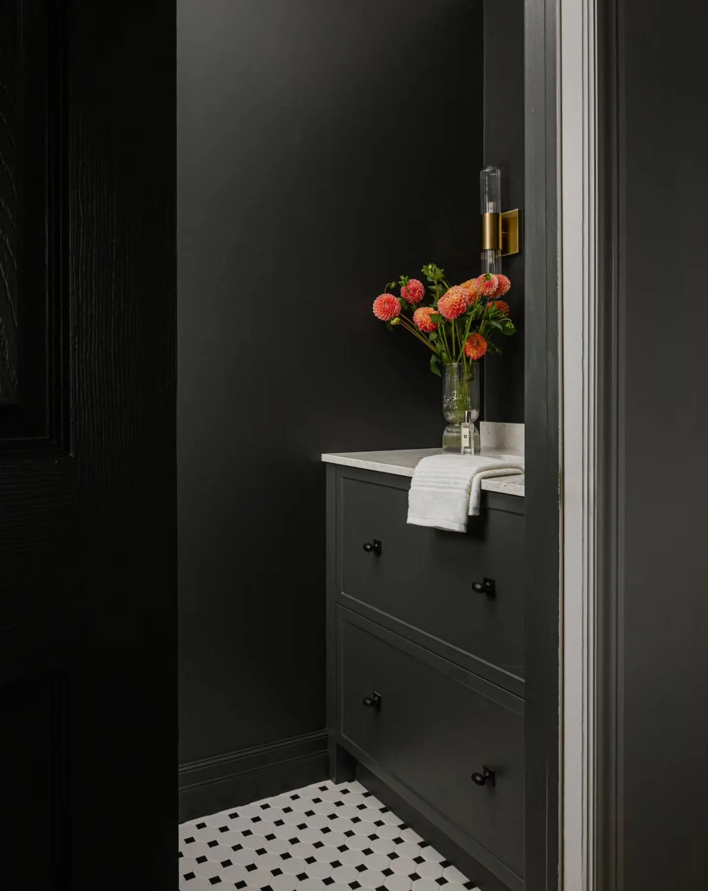 Prefab is made to fit a standard space. 

Custom is made to fit your space.

The fillers and toe kick on this vanity were carefully scribed to follow the walls and floor for a seamless, built-in finish.

That&rsquo;s the difference custom makes &mdas