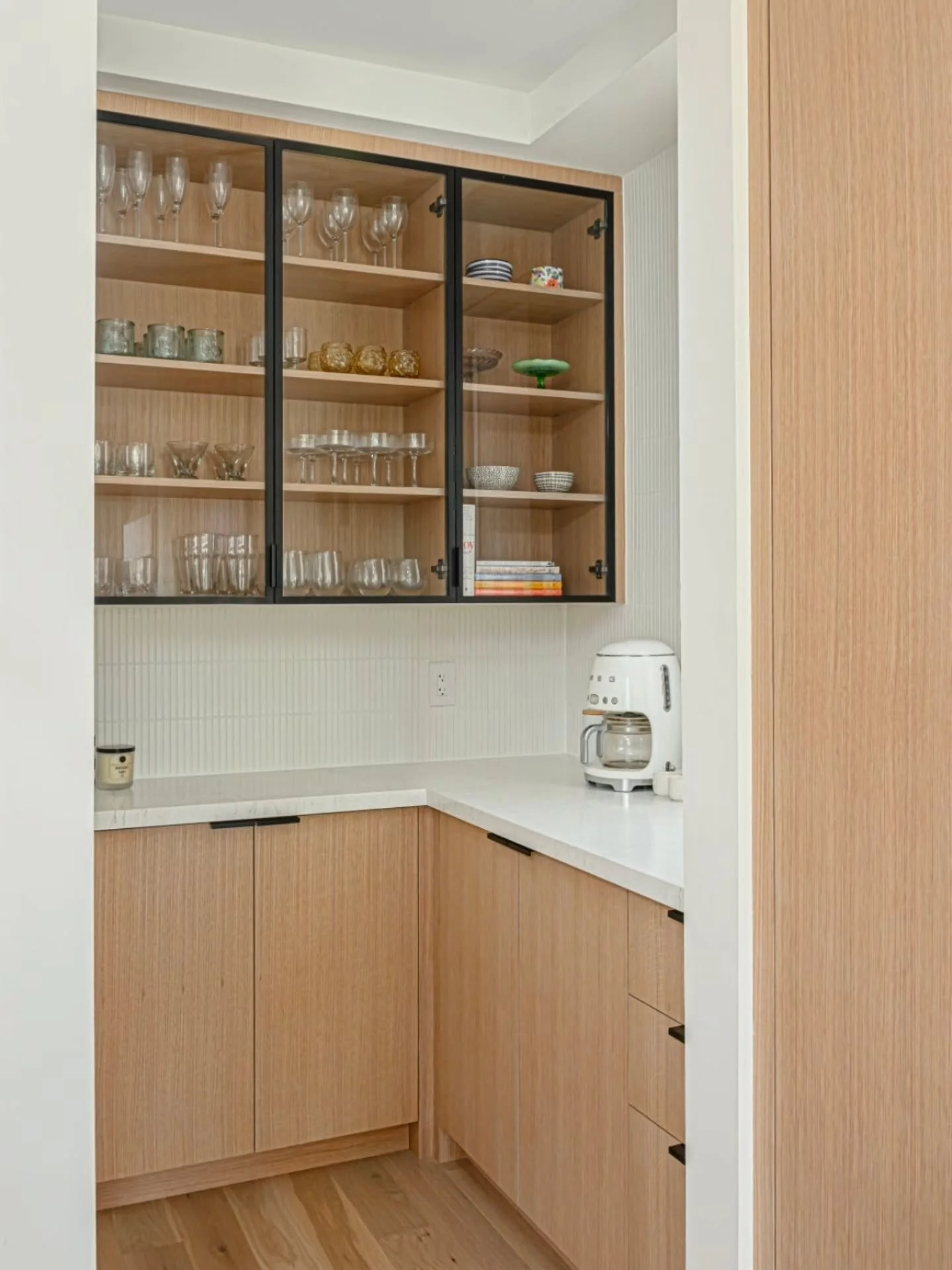 It&rsquo;s the details that make our custom millwork stand apart.

No bulky valance&mdash;the cabinet bottom is routed to conceal the integrated LED lighting for a clean, seamless look. 

Finished undersides, finished interiors, carefully grain-match