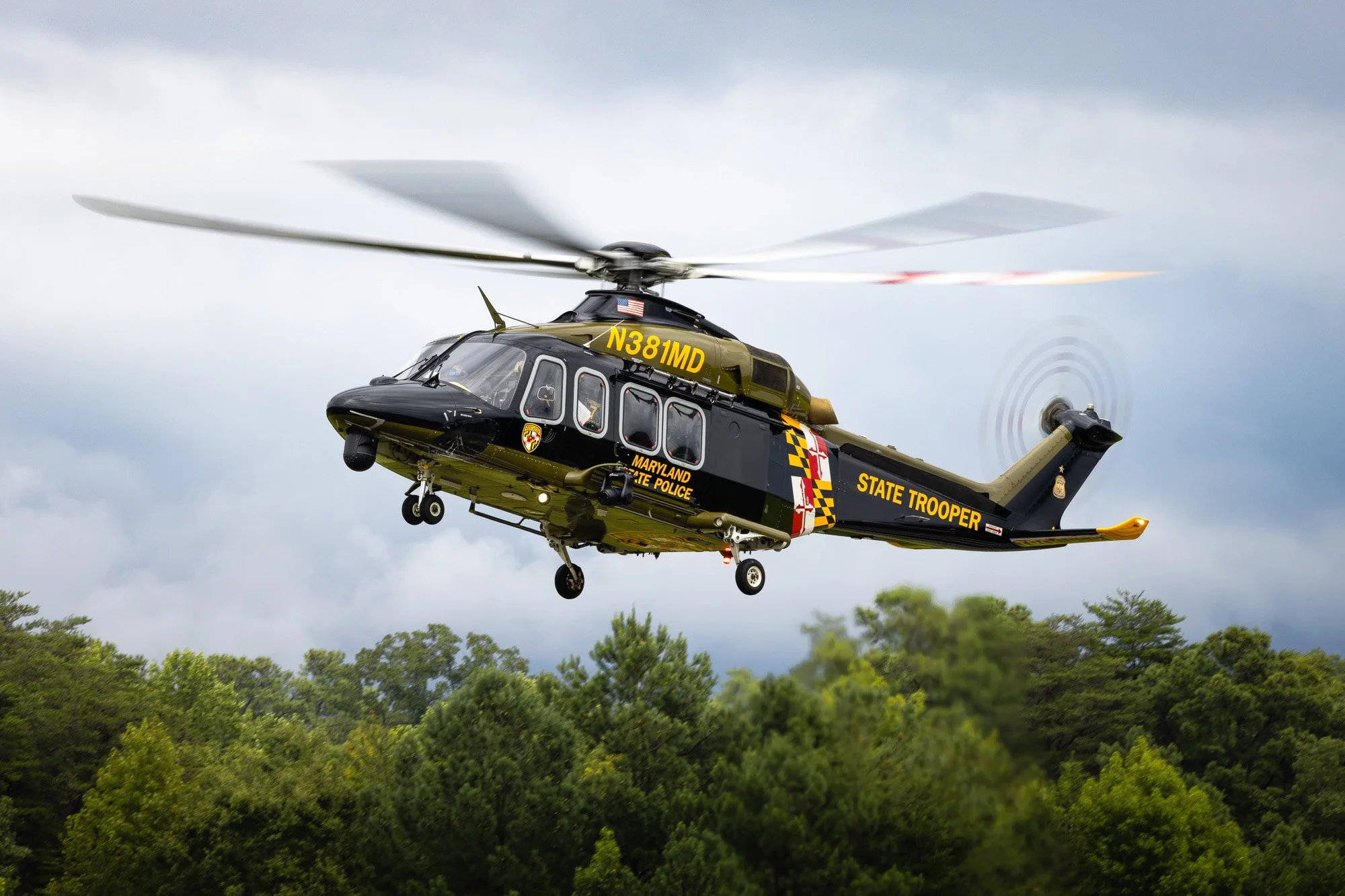 Leonardo AW139 (N381MD), callsign Trooper 7, operated by the Maryland State Police Aviation Command (MSPAC), executing pilot training during a gloomy day at St. Mary’s County Regional Airport (2W6).