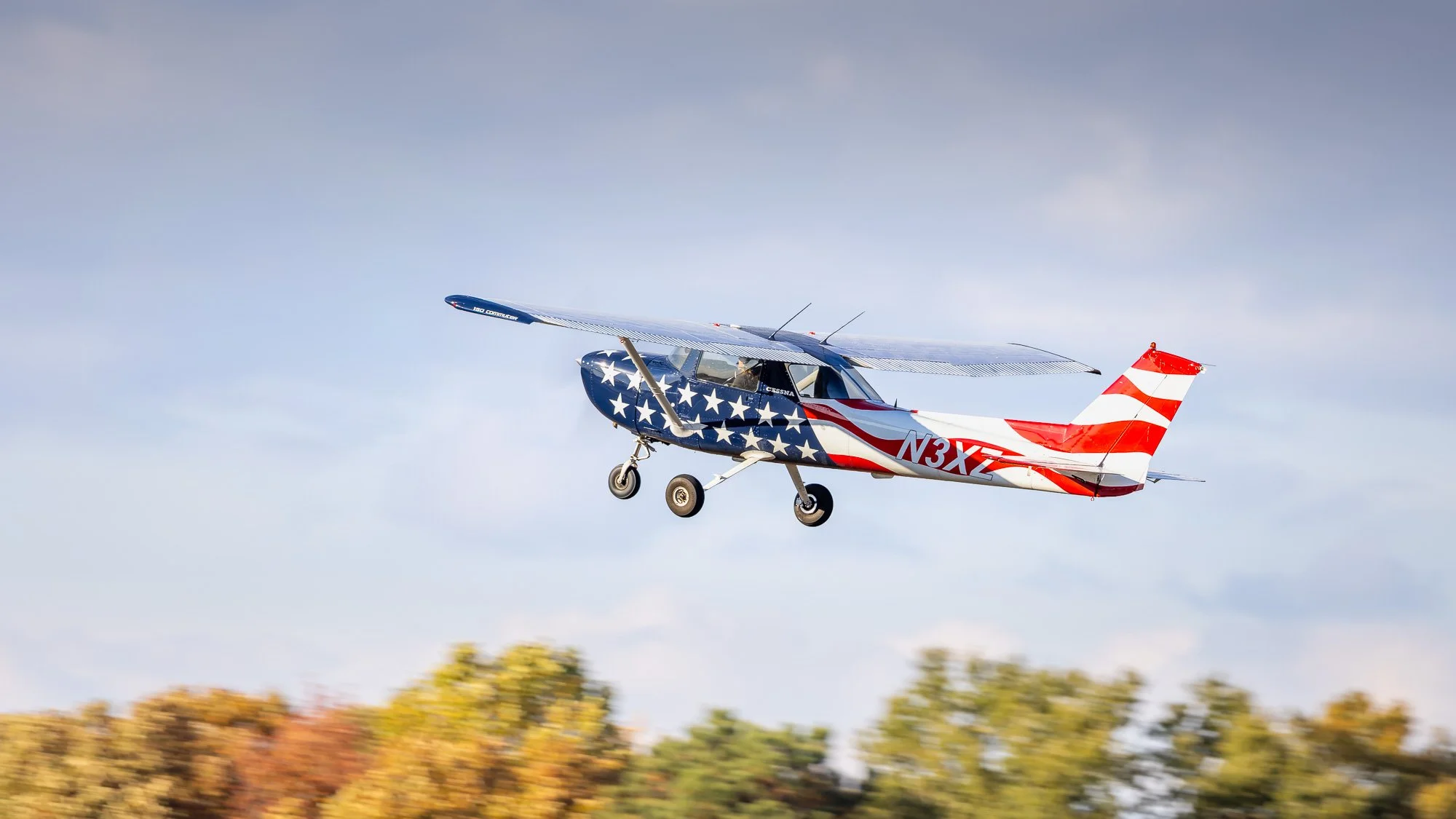 Cessna 150L (N3XZ) taking off from St. Mary's County Regional Airport (2W6) for a scenic flight over the fall colors.