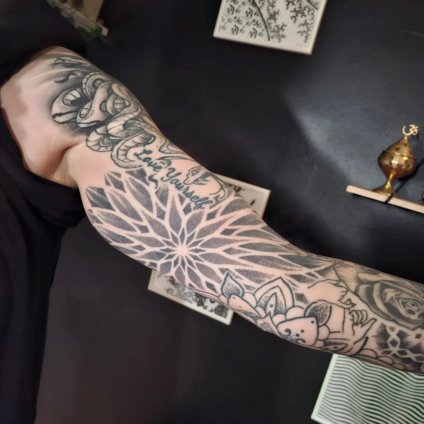 Fully healed gap-fillers for Emily we did well over a year ago. I love how everything settled and truly brought the arm into one compete sleeve. Do you have patchwork tattoos you'd like to fill with a cool background? Hit me up, and let's make some m