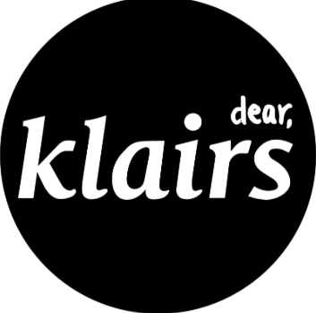 Black circle with white text that says "dear klairs".
