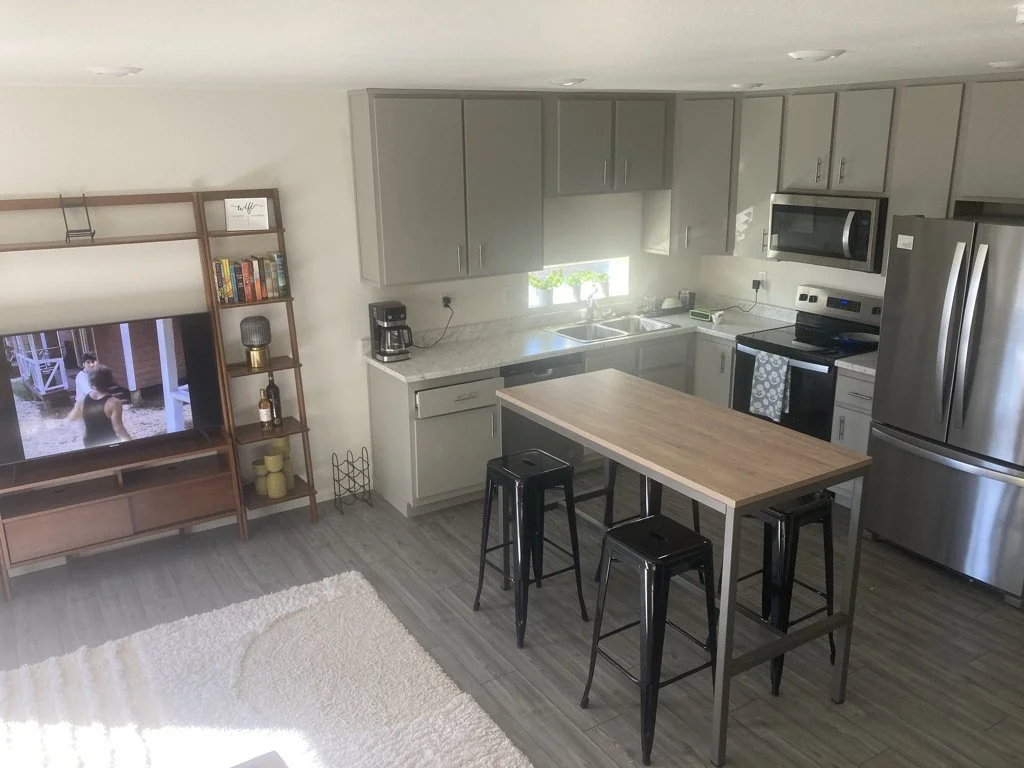 Kitchen is stocked with coffee, cereals and snacks