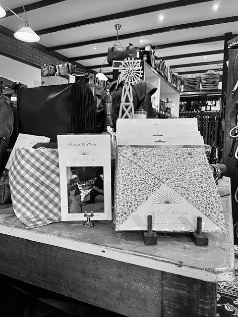 Rural Rays neck scarves displayed in the Kent Saddlery store in Stanthorpe.