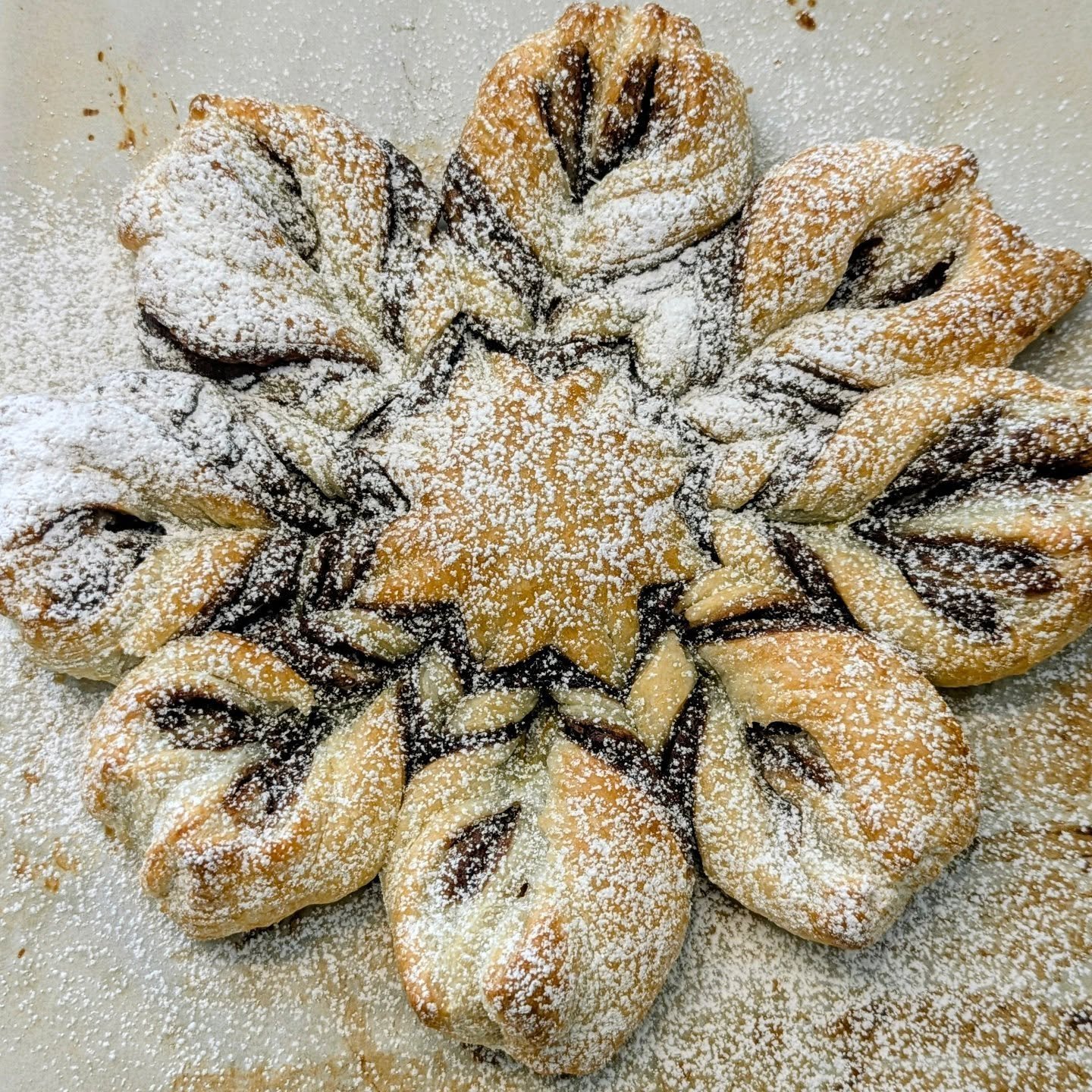 Ooooh she&rsquo;s fresh fresh ❄️🥐

Nutella snowflake puff pastry just out of the oven and officially on the bakery cart! Warm, flaky, chocolatey perfection...it's 🤌✨

Swing by while it&rsquo;s still warm, or DM me if you want me to hold one for you