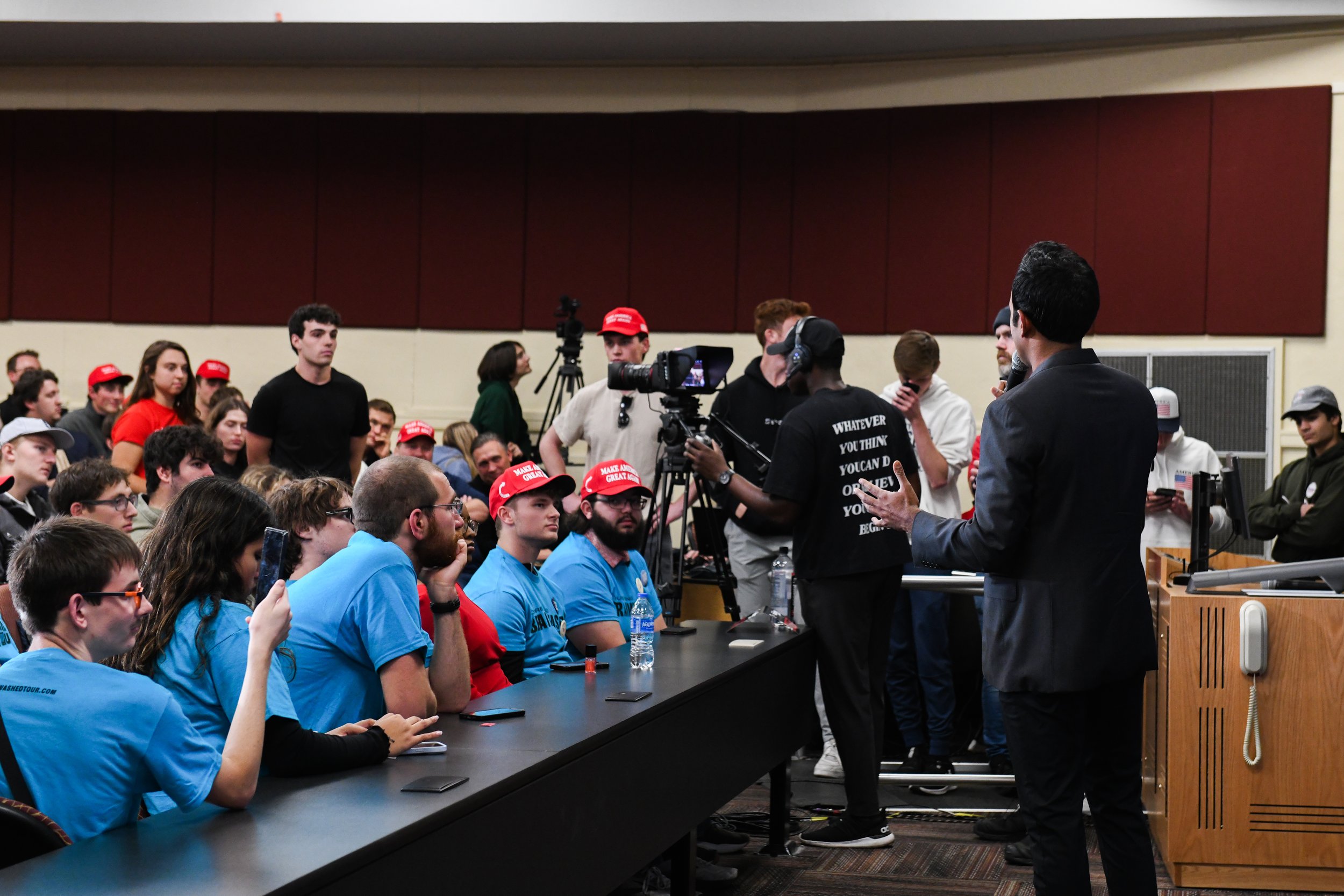 Vivek Ramaswamy answers an audience member's question during the "You're Being Brainwashed" tour on Thursday, Oct. 17, 2024, in University Park, Pa.