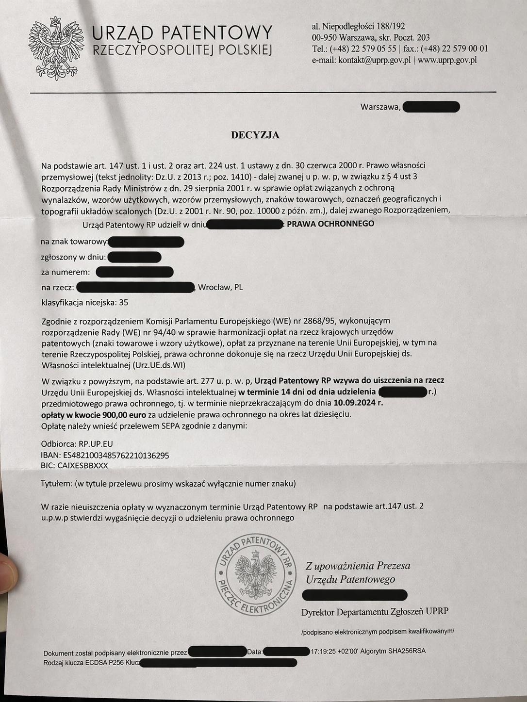 Document styled as a Polish Patent Office decision used in a trademark payment scam