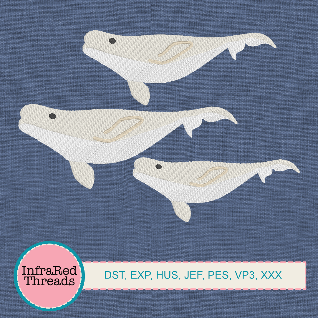 Embroidered beluga whale designs in three sizes with soft white body and fin detail