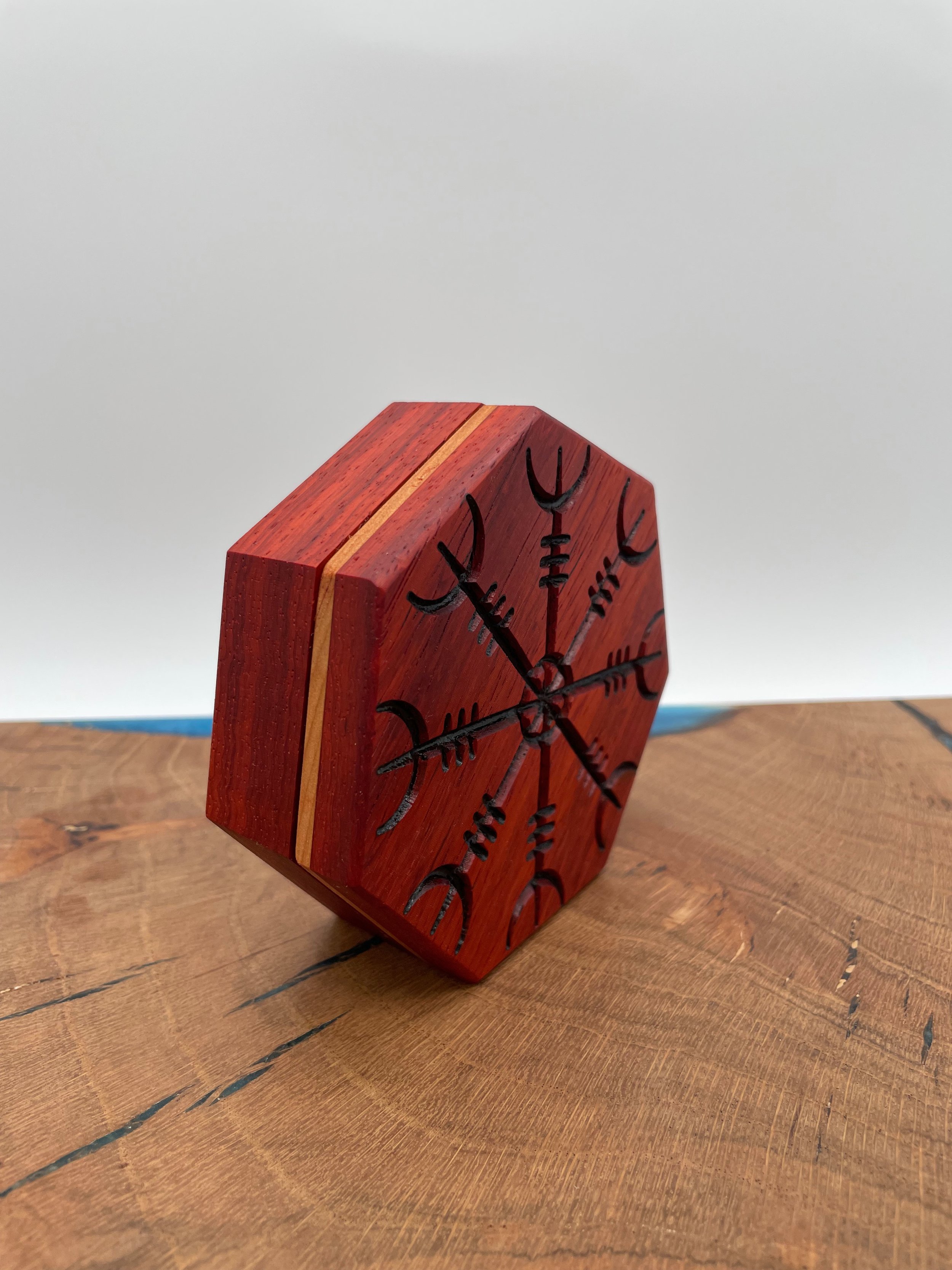 helm of awe deep carved padauk wood.jpeg