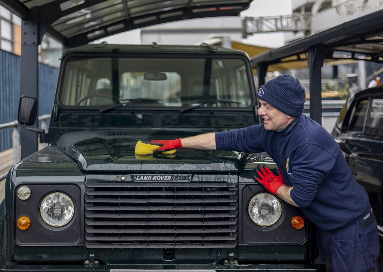 2-facilities-officer-kevin-cleaning-the-landrover.jpg