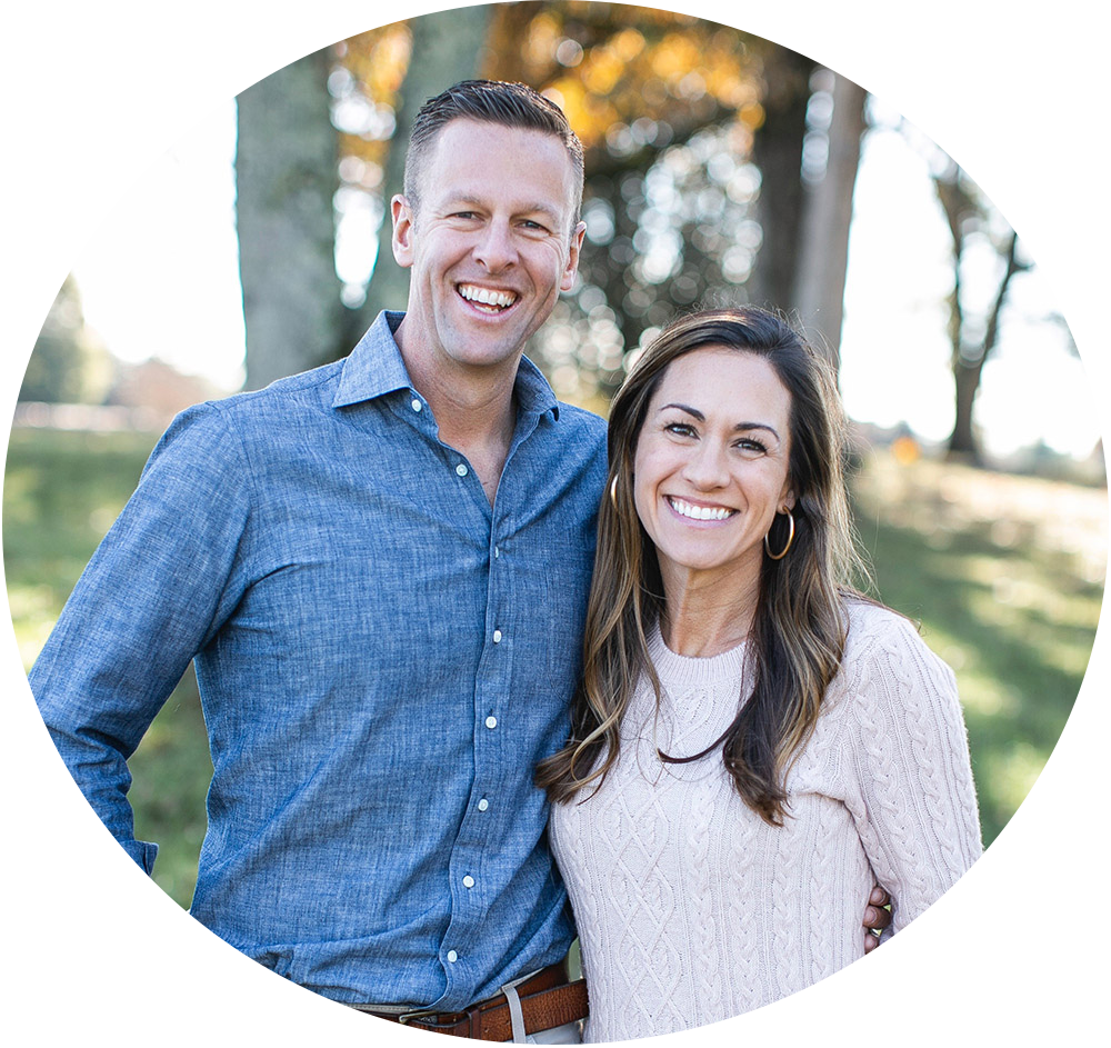 Image of Chris and Lyndie Carneal standing side by side smiling